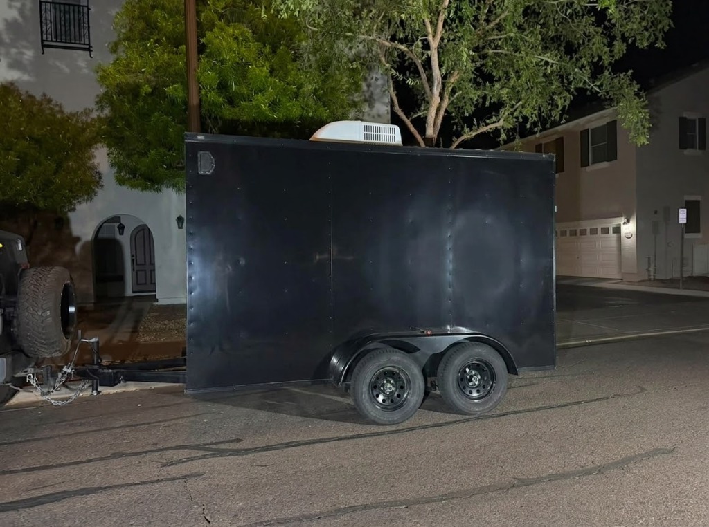 Plain black trailer before wrap